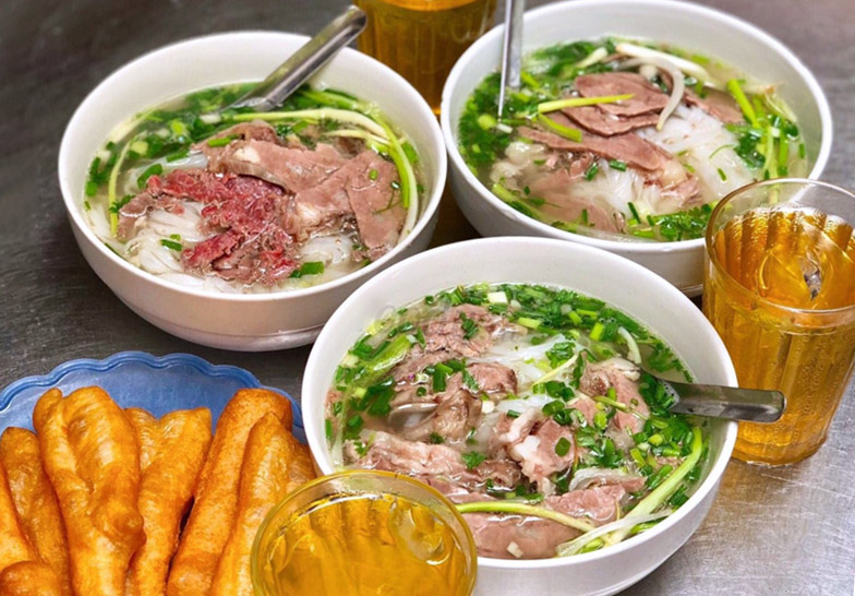 a steaming bowl of pho