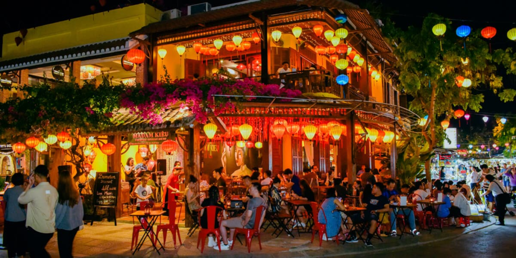 Hội An hits different after midnight. Sipping a cocktail by the river, watching the lantern reflections dance on the water