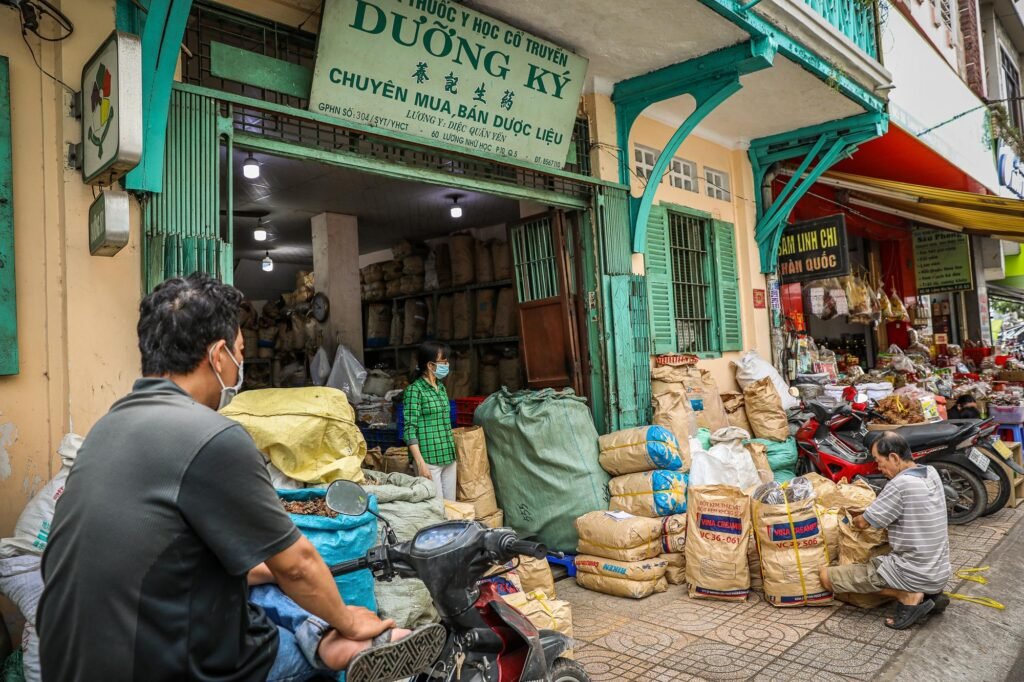 Traditional herbal medicine shops along Hai Thuong Lan Ong Street preserve centuries of Chinese healing practices and cultural heritage.