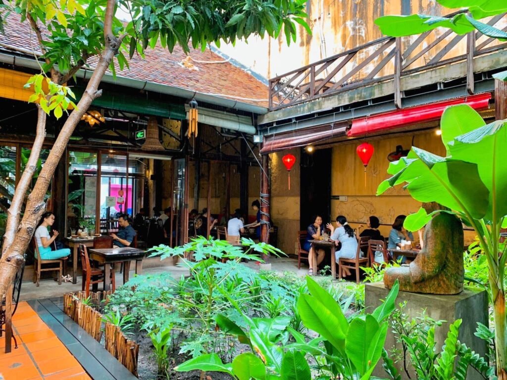 A peaceful courtyard hidden behind busy streets offers travelers a refreshing escape from the energy of downtown Saigon.