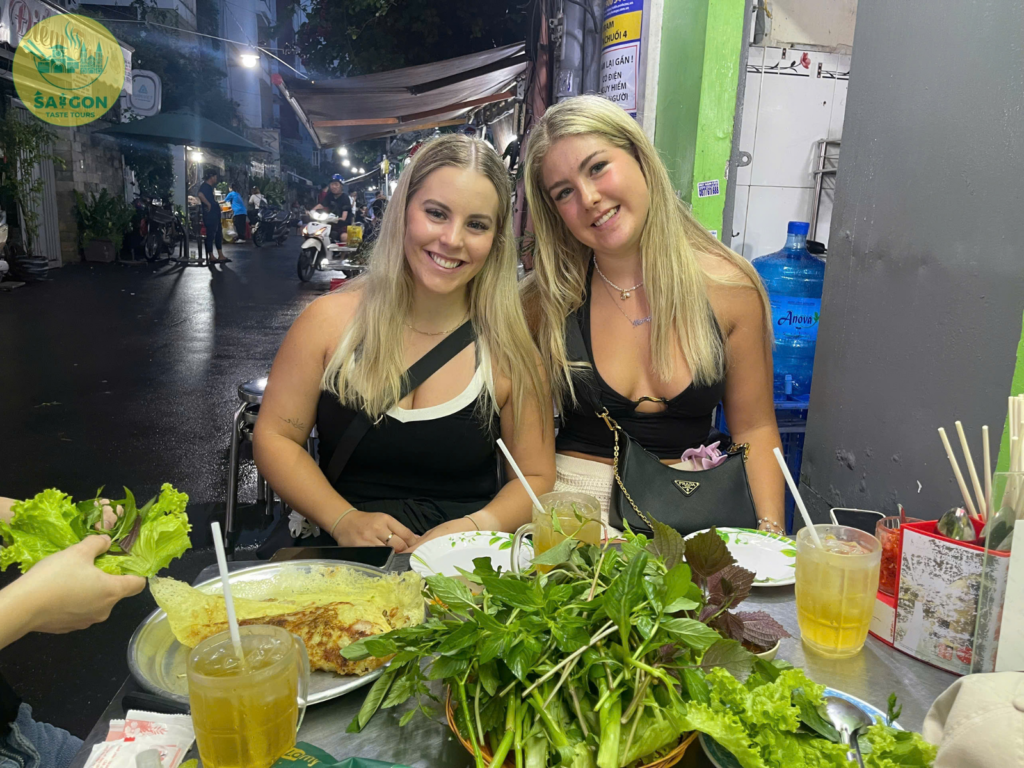 The ultimate rule of a Saigon food adventure: if there are tiny plastic stools on the sidewalk, pull one up and start eating.