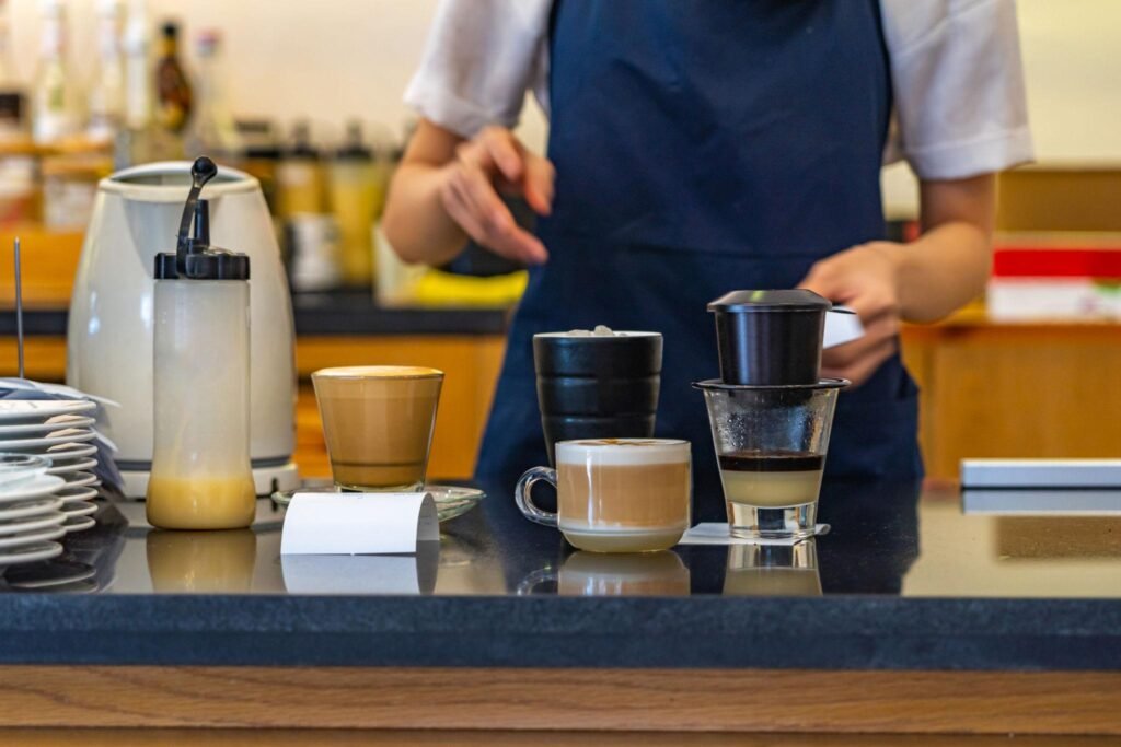 Enjoying a glass of traditional Vietnamese iced coffee is one of the most authentic ways to experience local cafe culture.